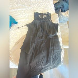 Peplum black mini dress